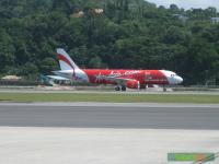 AirAsia’s first Airbus A320 to be stationed at Kota Kinabalu, taxis down the runway.