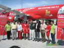 Striking a pose outside the first AirAsia Airbus A320 to be based in Kota Kinabalu