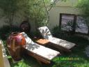 Loungers in the little garden from where you can soak up some sun into your pampered body
