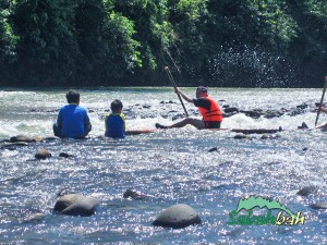Bamboo rafting on the Kiulu River during the 4M Challenge