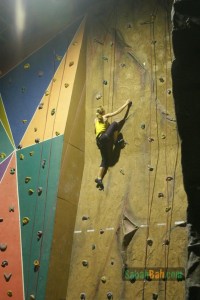 Scurrying up the wall. Women, apparently, can do it better than men.